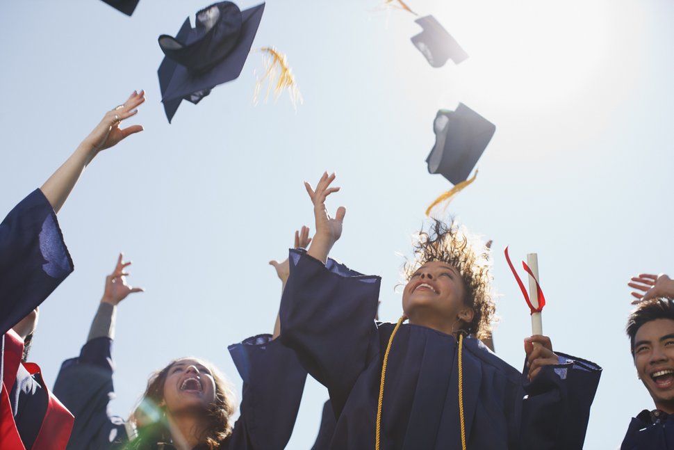 college high school graduation celebration cap toss